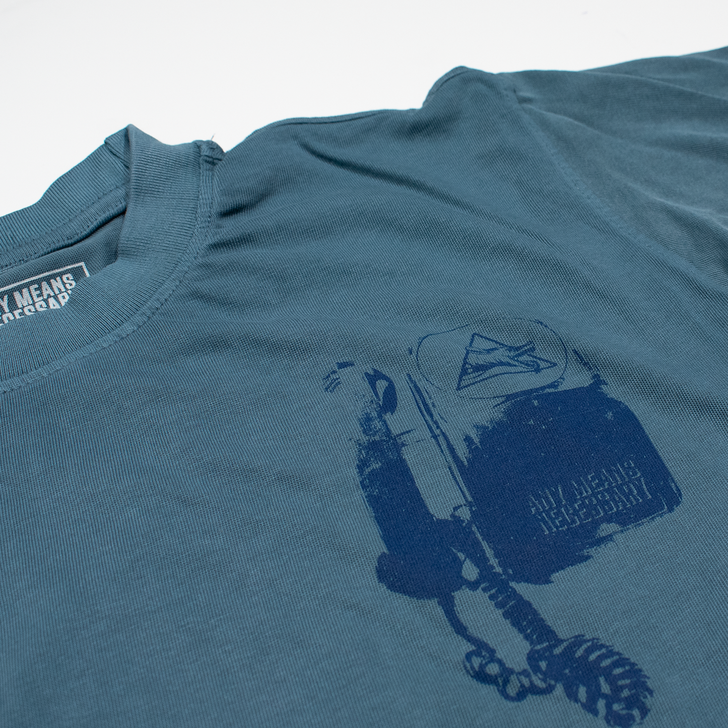 any means necessary shawn coss blackphone t shirt pebble blue front close up