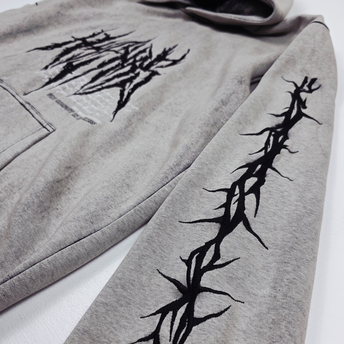 any means necessary shawn coss bleached fangs hyenas pullover hoodie sleeve