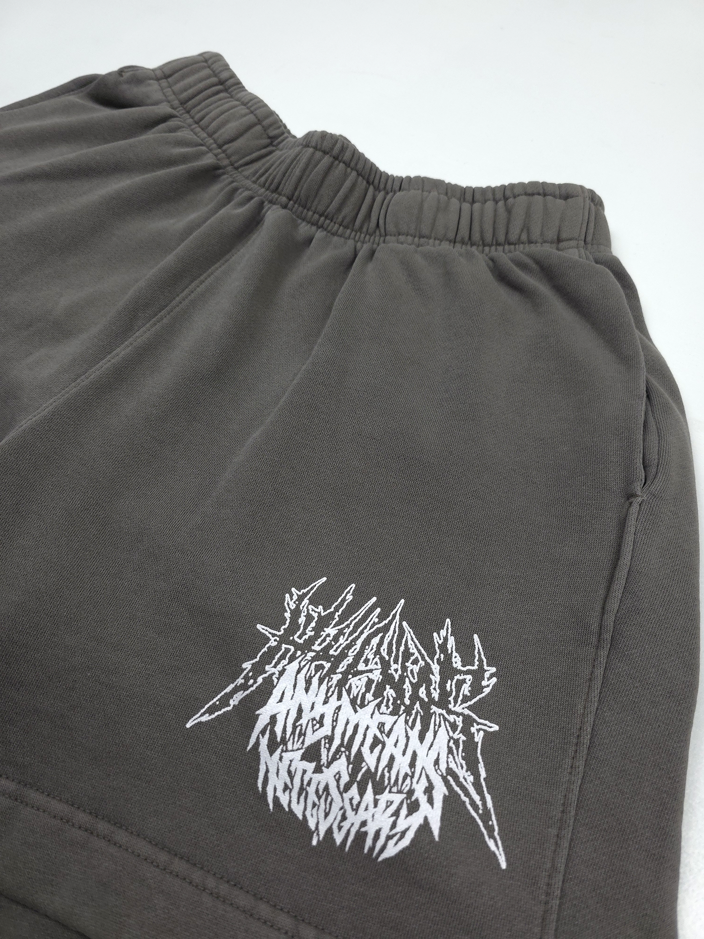 any means necessary shawn coss bone crusher sweat short faded grey up close