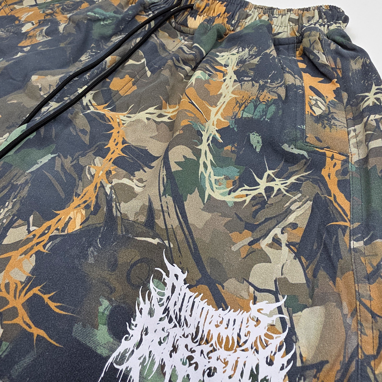 any means necessary shawn coss mayhem french terry shorts camo front