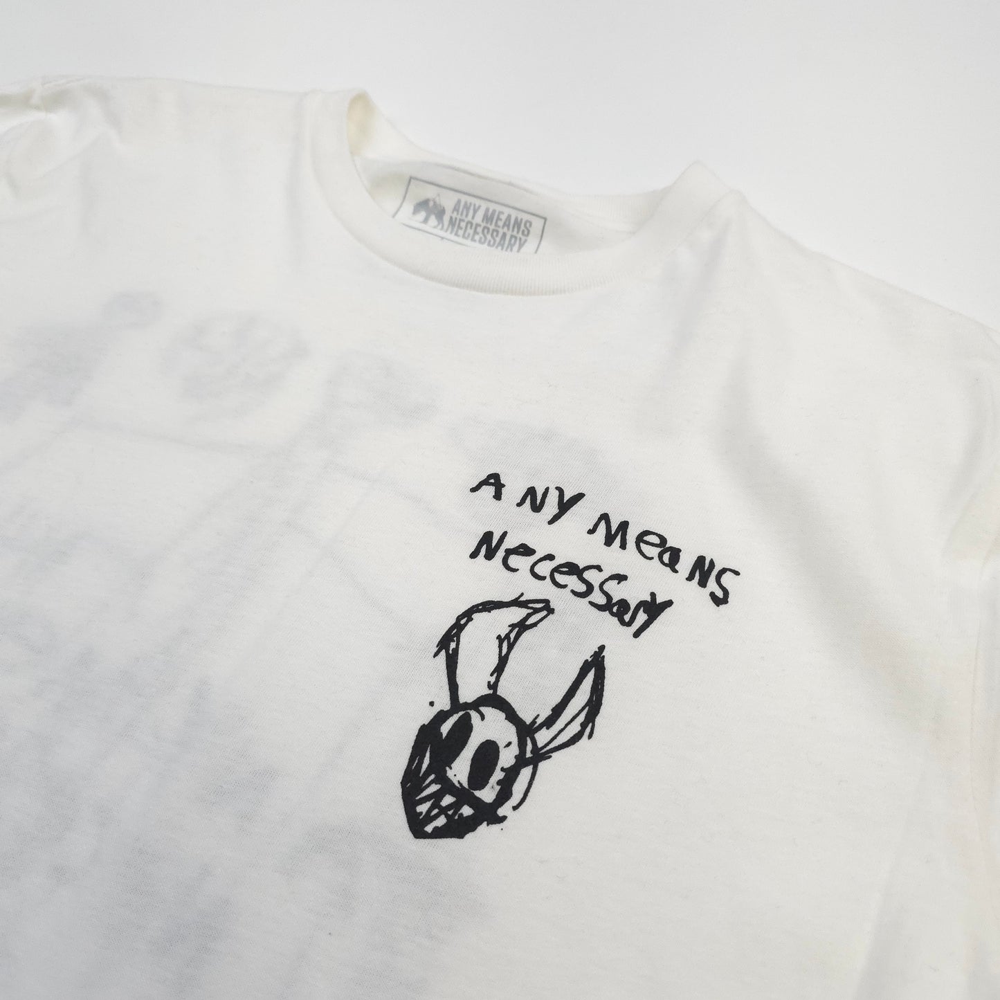 any means necessary shawn coss corrupted youth t shirt white front close up