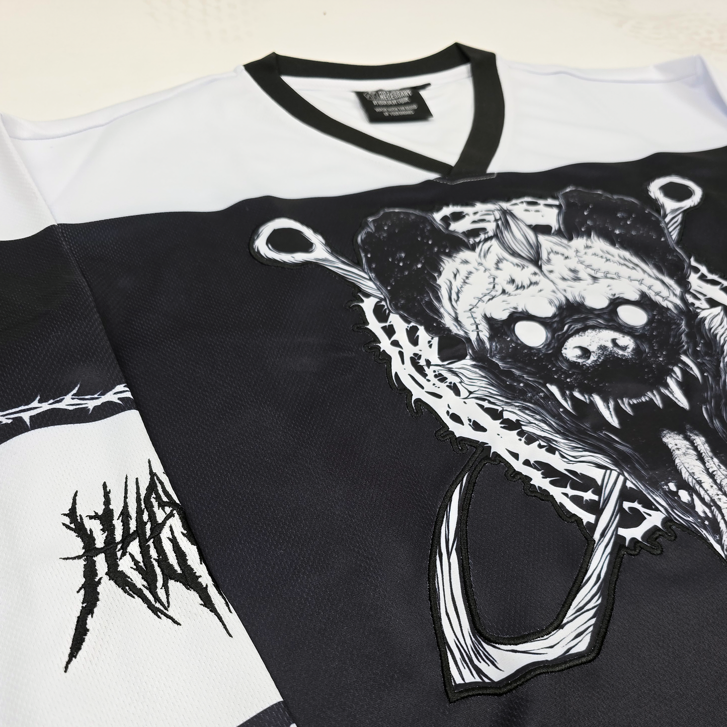 any means necessary shawn coss goon squad hockey jersey up close