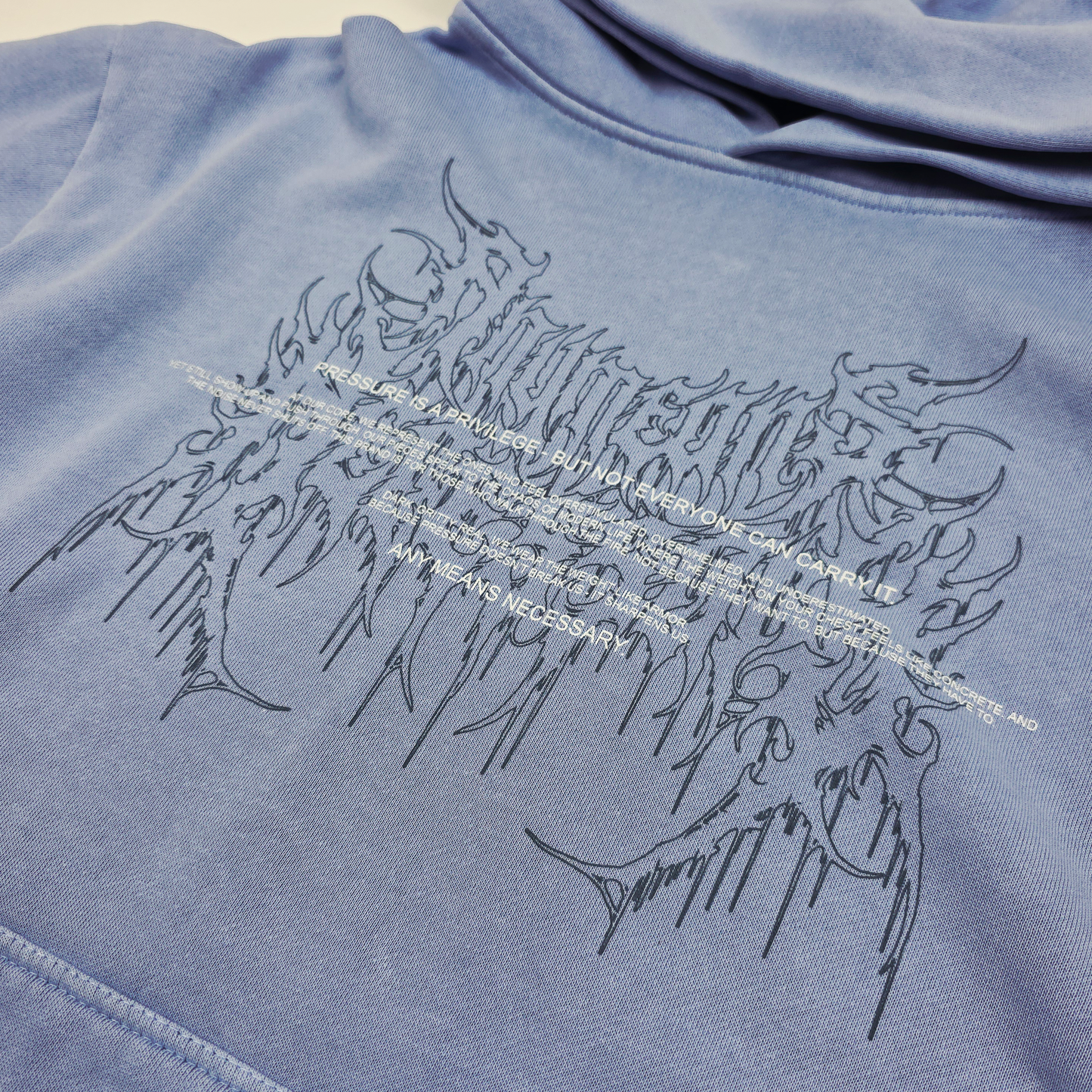 any means necessary shawn coss pressure is a privilege pullover hoodie grape front up close