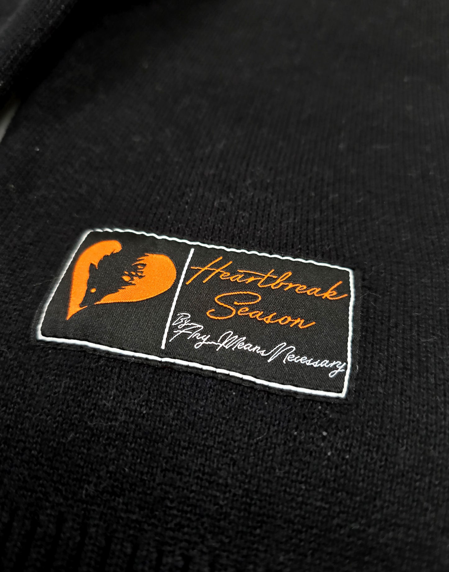 any means necessary shawn coss self destruct knit sweater woven label