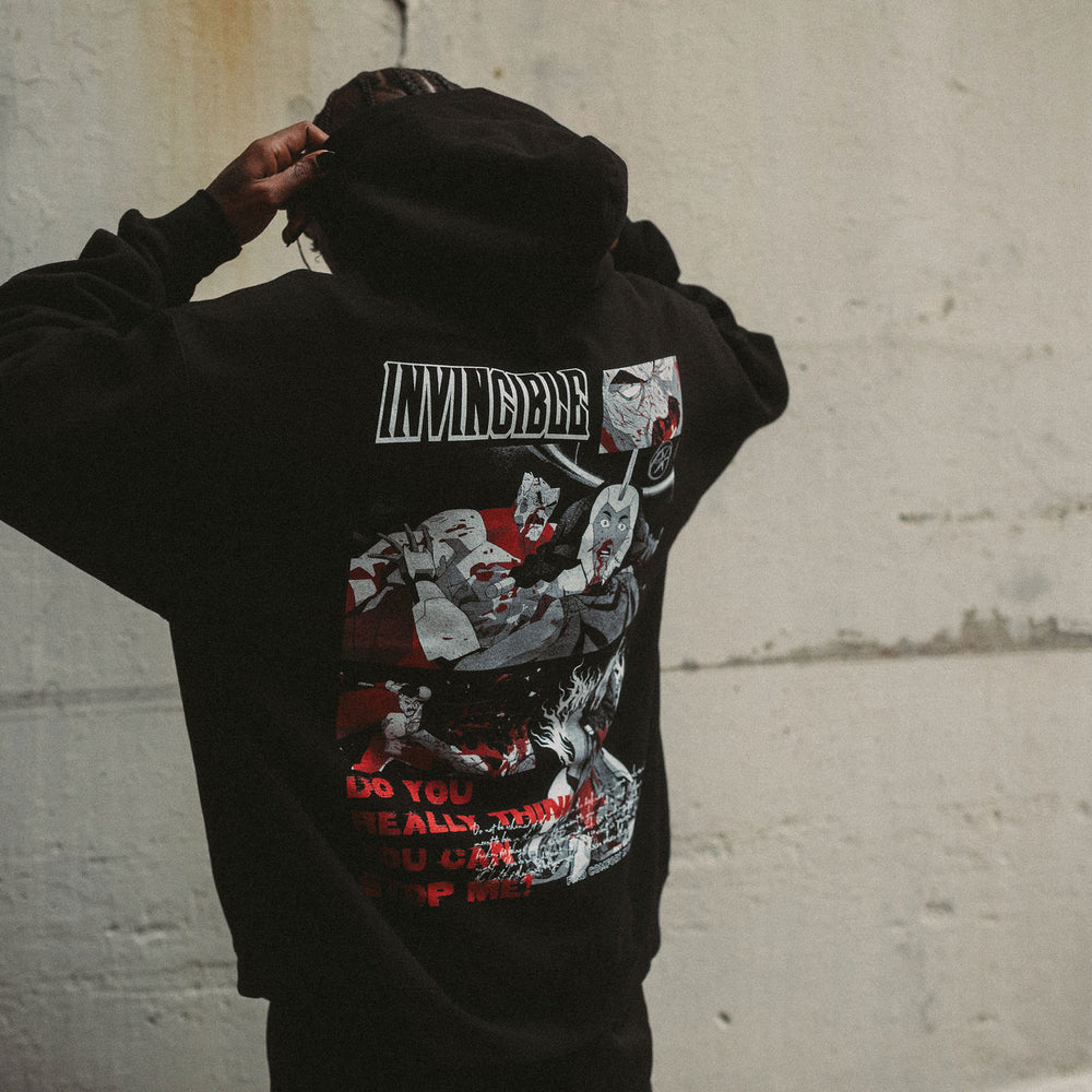 
                      
                        INVINCIBLE NECK SNAP HOODIE FRONT OMNI MAN WAR WOMAN LIFESTYLE FRONT BACK
                      
                    