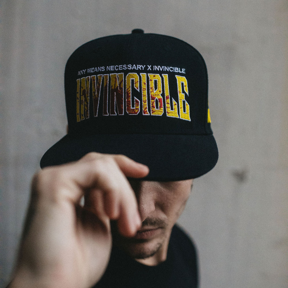 Invincible Splatter Hat – Any Means Necessary Clothing