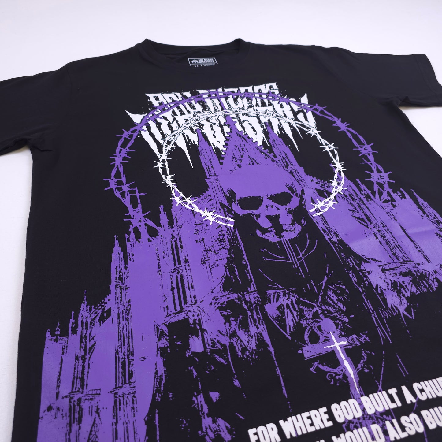 any means necessary shawn coss cathedral t shirt black and purple close up