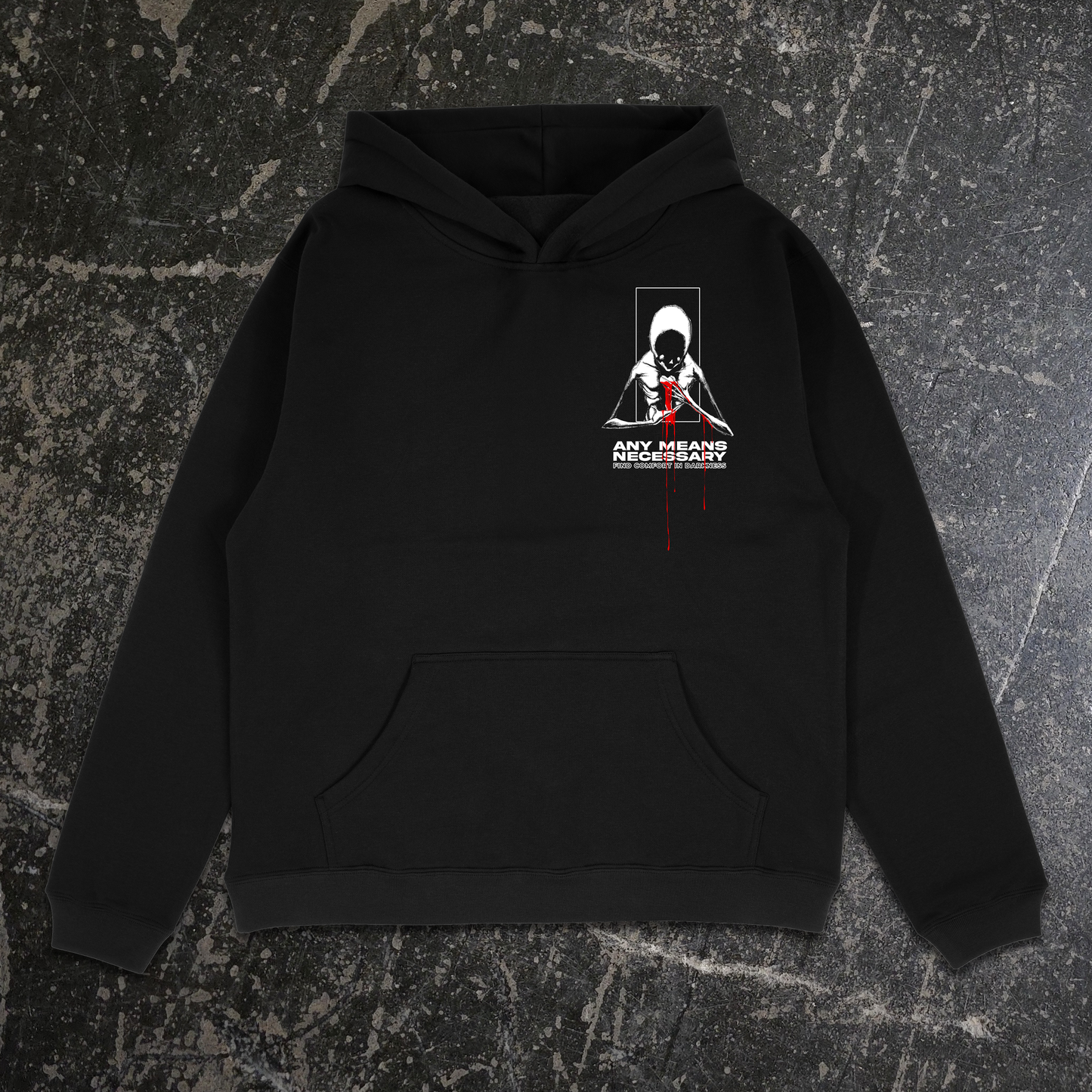 Black hoodie with graphic design on a textured gray background