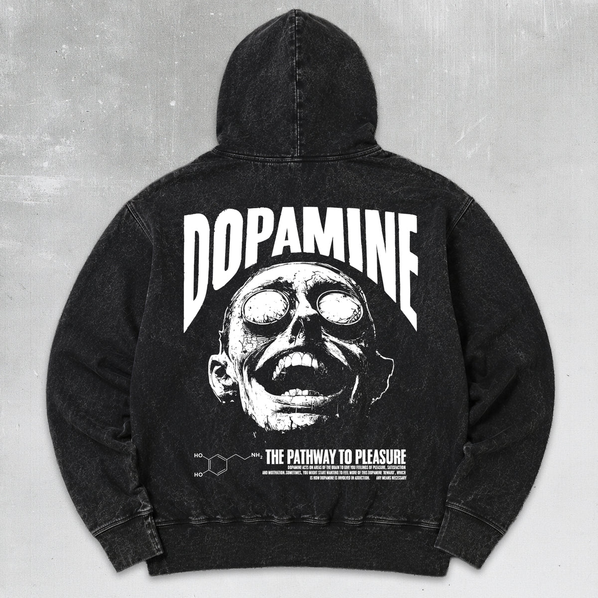 A black acid-wash hoodie shown from the back, featuring a large white graphic print of a skull with goggles and the word 'DOPAMINE' in bold letters, with additional text reading 'THE PATHWAY TO PLEASURE' and a chemical structure below.