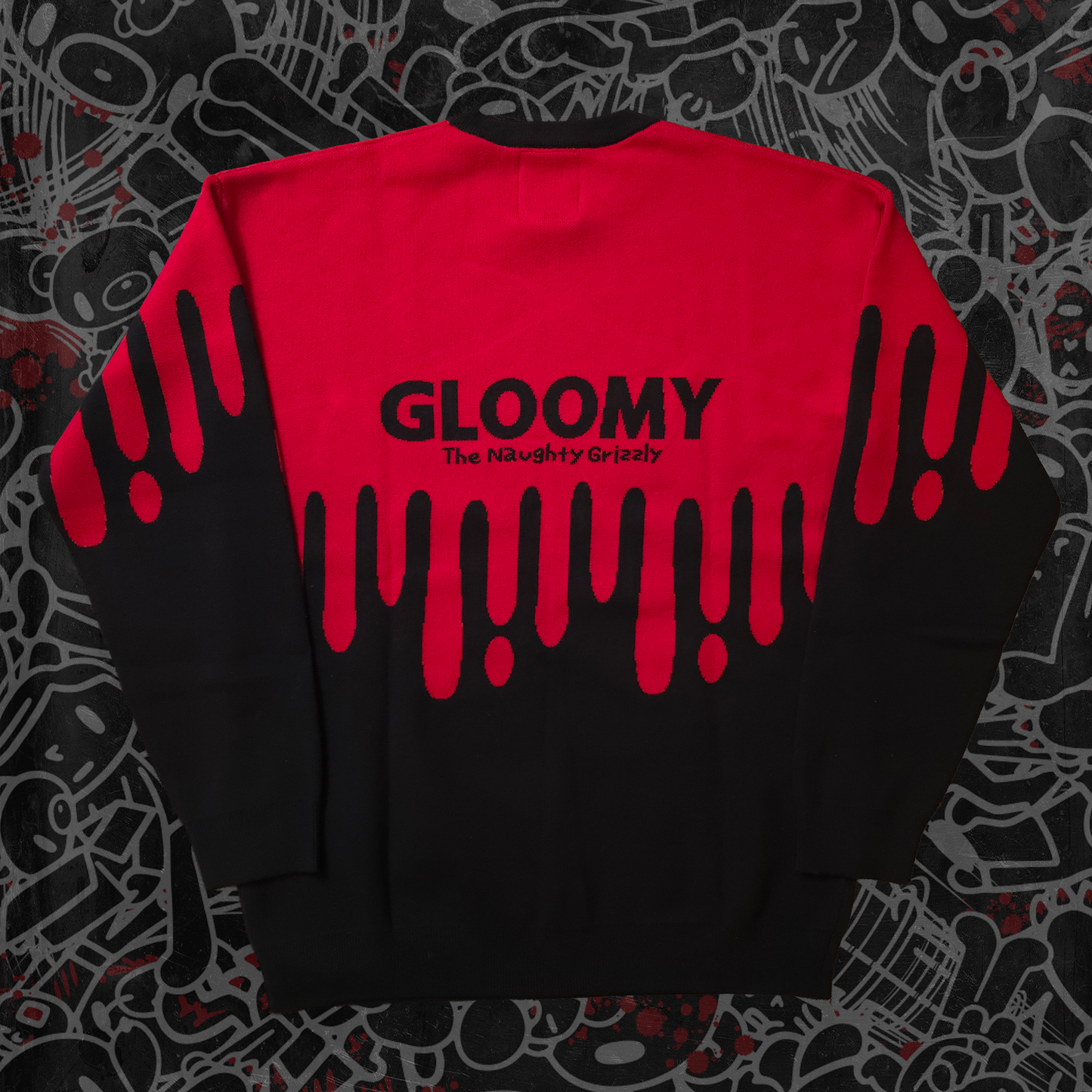 Black sweatshirt with red text and graphics on a patterned background