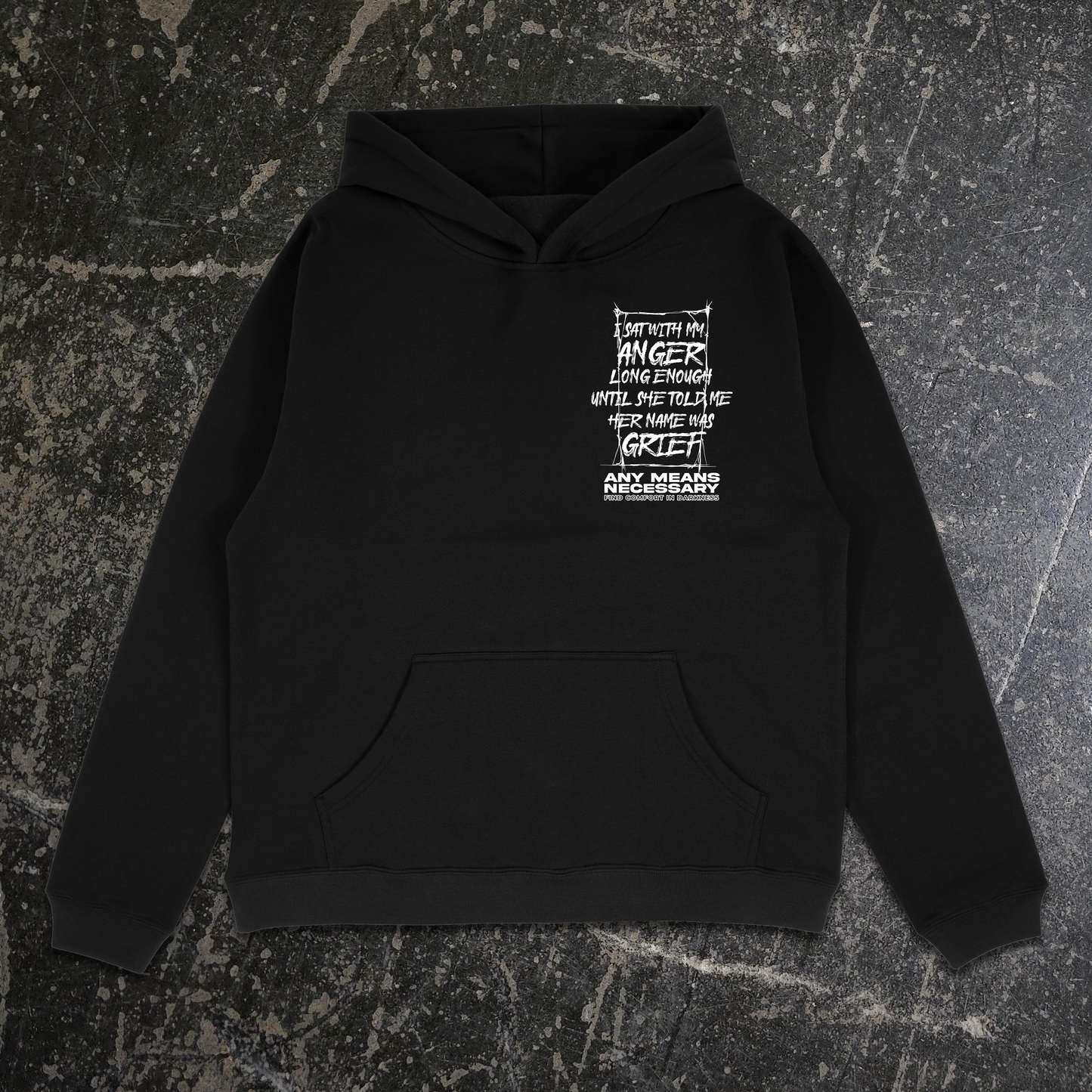 Black hoodie with a white graphic design on the back against a textured gray background, shawn coss art about grief