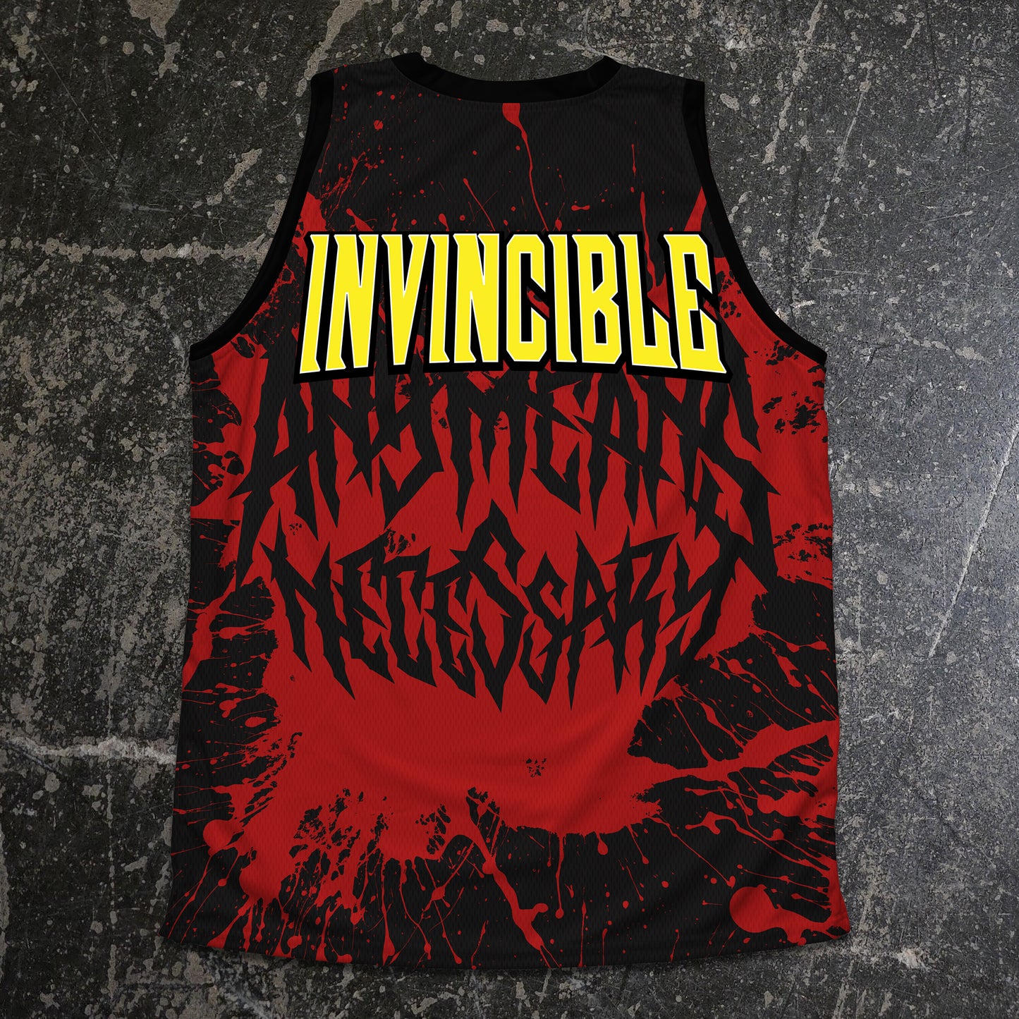 Tank top with 'INVINCIBLE' text in yellow on a red and black abstract design background