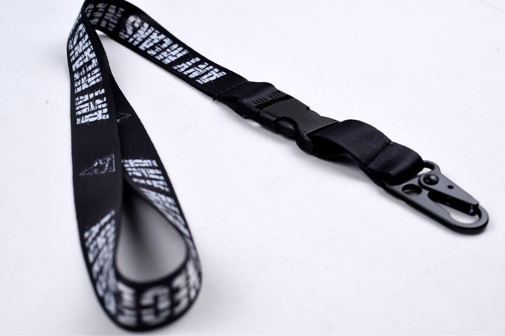 any means necessary poster shawn coss drips lanyard black