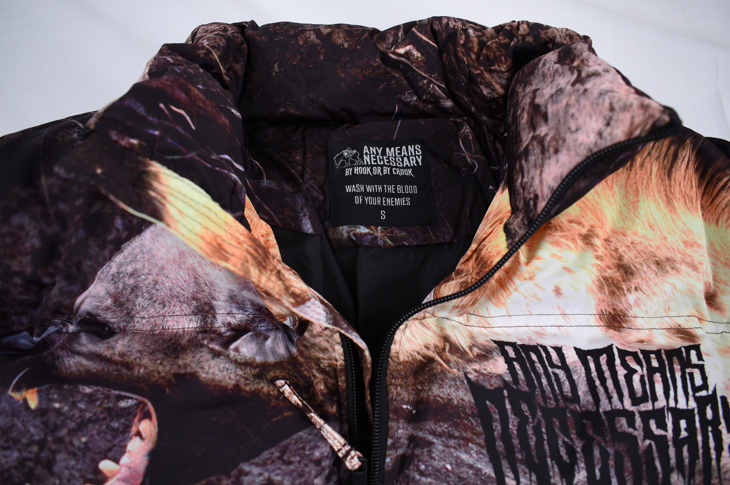 
                  
                    any means necessary shawn coss last stand puffer jacket close up label
                  
                