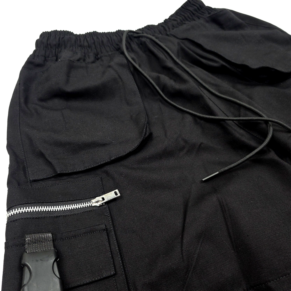 
                      
                        any means necessary shawn coss pack tactics cargo shorts black up close
                      
                    
