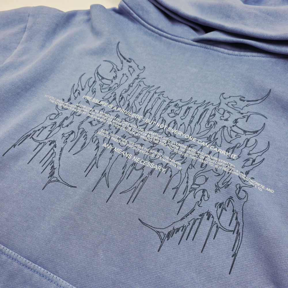 
                      
                        any means necessary shawn coss pressure is a privilege pullover hoodie grape front up close
                      
                    