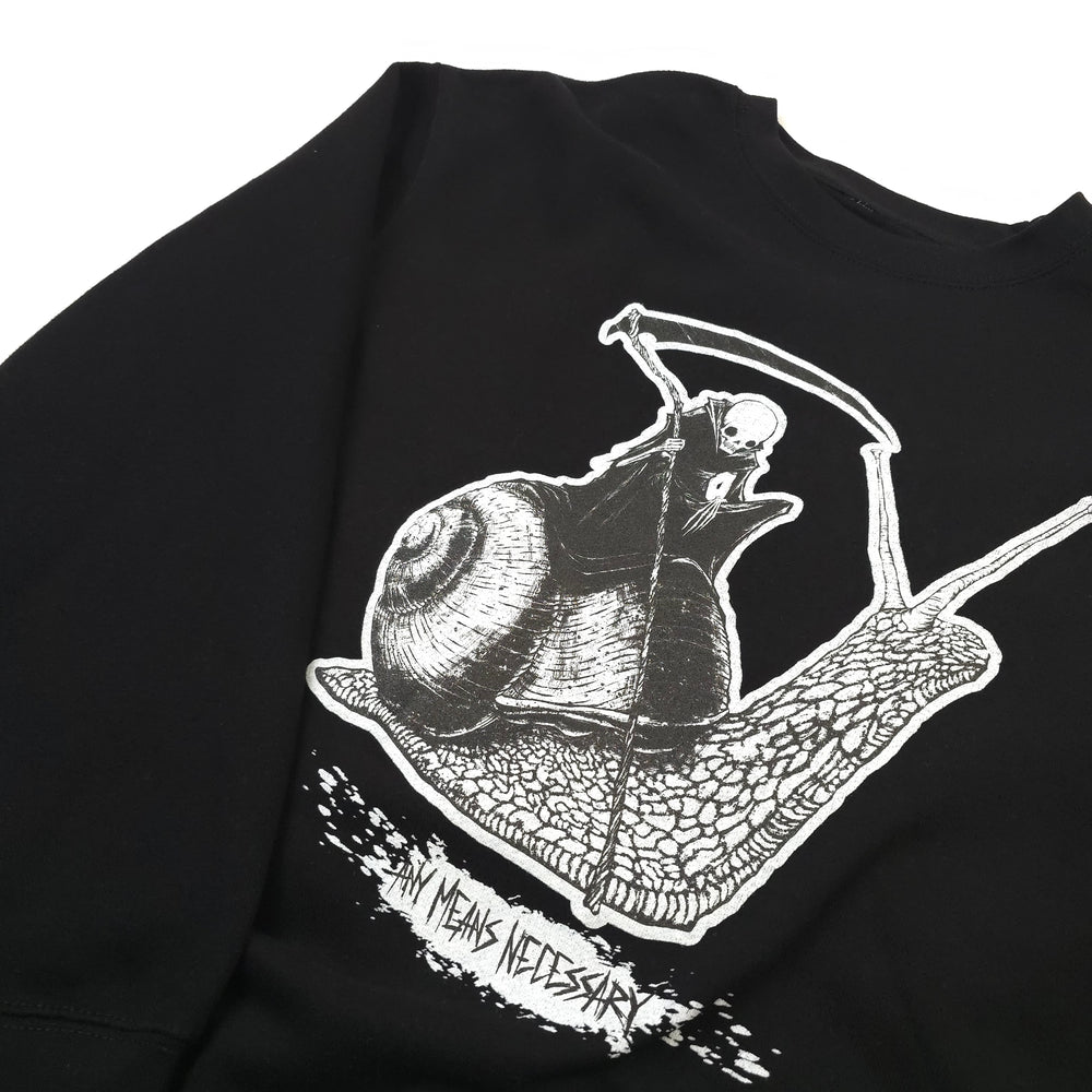 
                      
                        any means necessary shawn coss slow death crewneck sweatshirt black up close
                      
                    