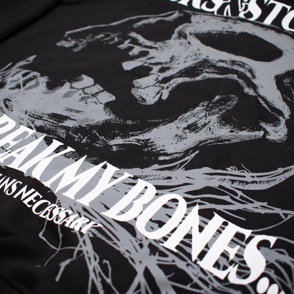 
                      
                        any means necessary shawn coss sticks and stones pullover hoodie black up close
                      
                    