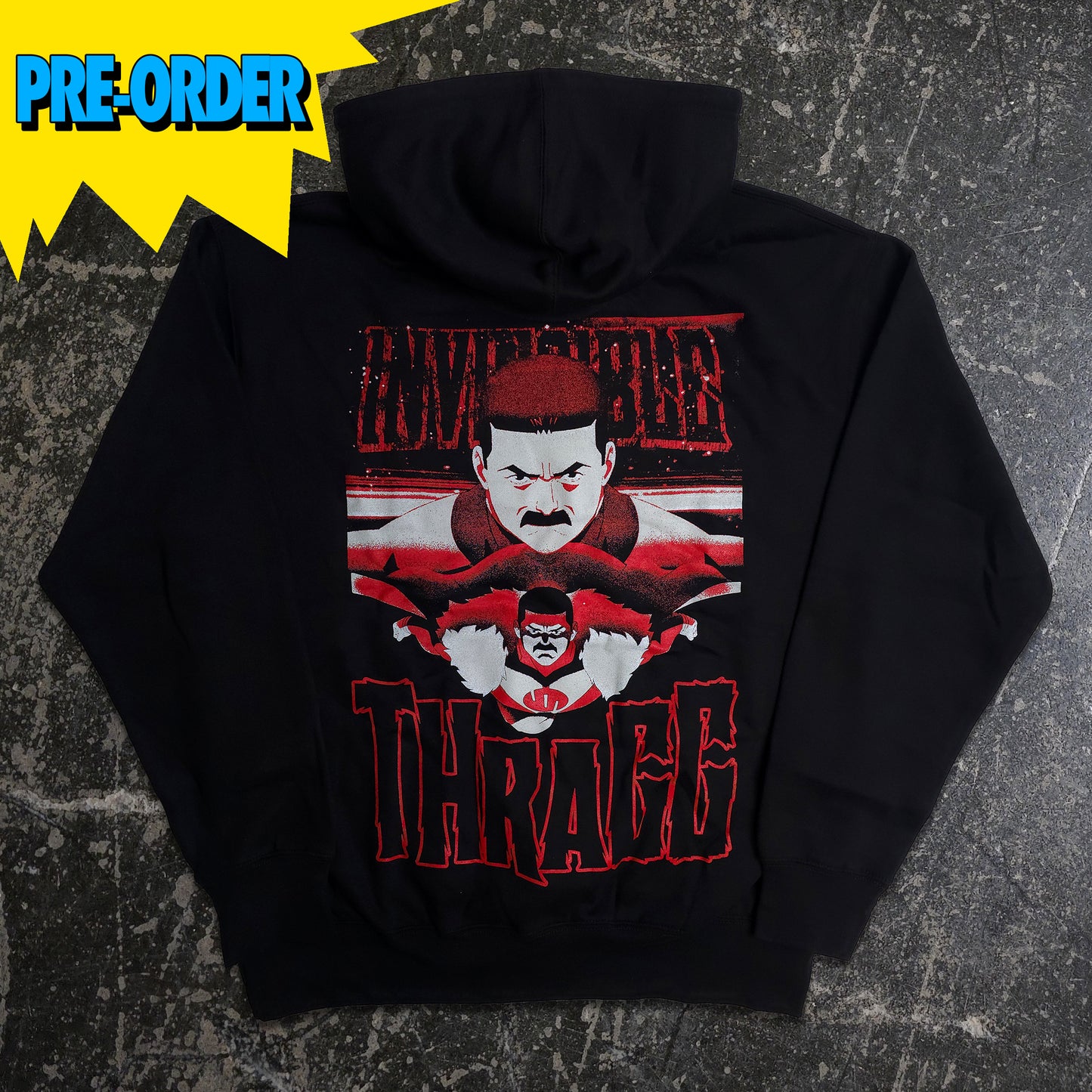 Black t-shirt with red and white graphic design featuring a character and 'THRAGG' text on a textured gray background. Officially licensed Invincible