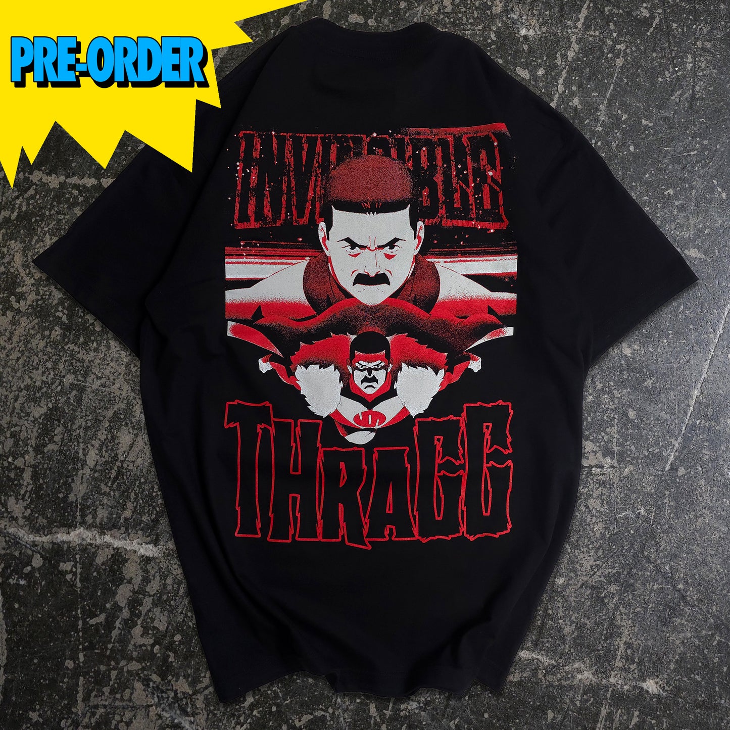 Black t-shirt with red and white graphic design featuring a character and 'THRAGG' text on a textured gray background. Officially licensed Invincible