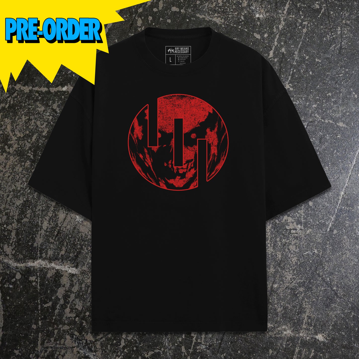 Black t-shirt with red graphic design on a textured gray background