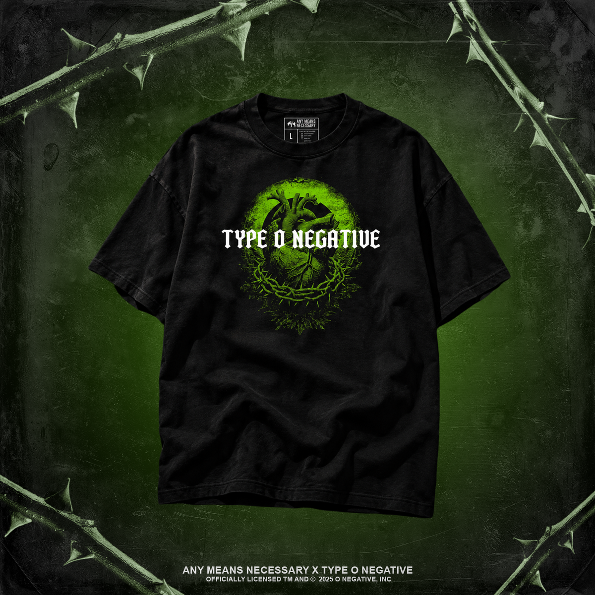 A black short-sleeve graphic T-shirt centered on a dark green textured background with thorny branches framing the edges. The shirt features a bright green circular graphic with an anatomical heart and the words 'TYPE O NEGATIVE' in white across the chest.