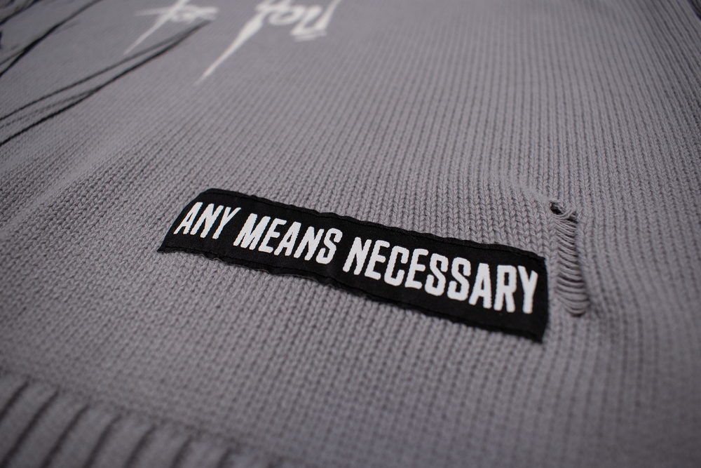 
                  
                    any means necessary shawn coss war with myself knit sweater front bottom
                  
                