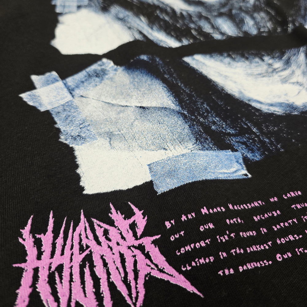 
                      
                        any means necessary shawn coss what lies beneath t shirt black close up
                      
                    
