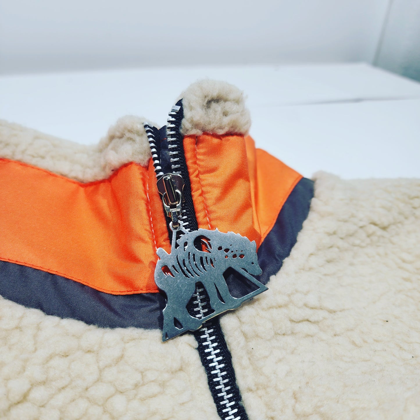 
                  
                    any means necessary shawn coss winter sherpa polar fleece jacket cream and orange
                  
                